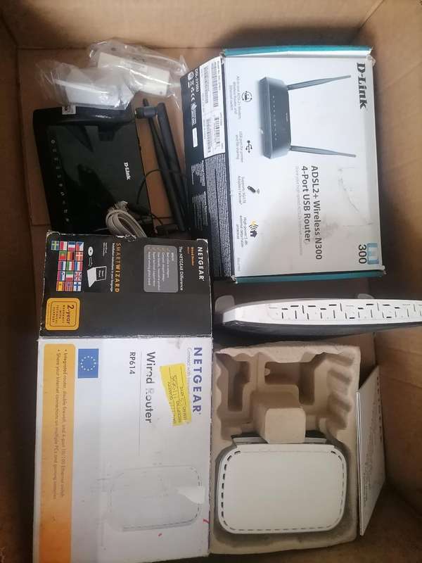 **LOT OF ROUTERS ETC*ONE BID FOR LOT AS PER PICS**