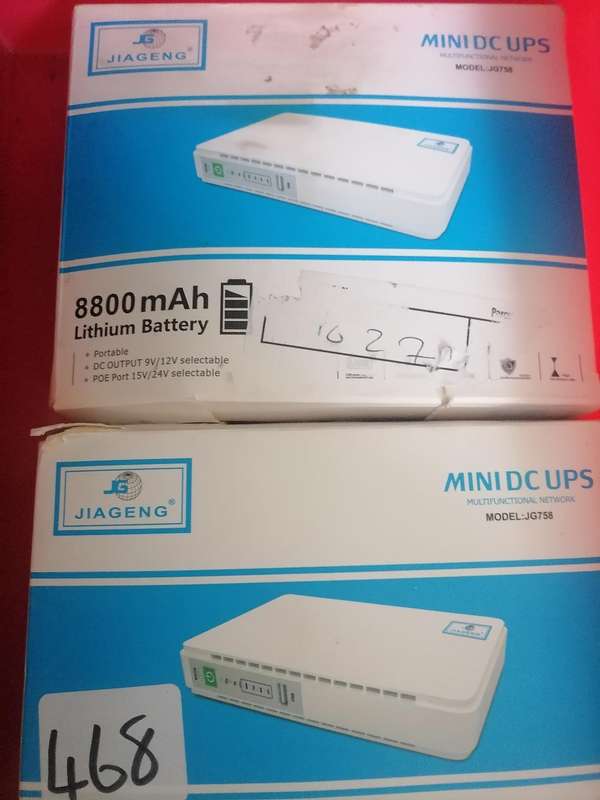 Lot of 2 x Jiageng 8800 mAh UPS with cables in box