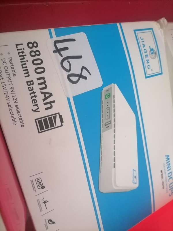 Lot of 2 x Jiageng 8800 mAh UPS with cables in box