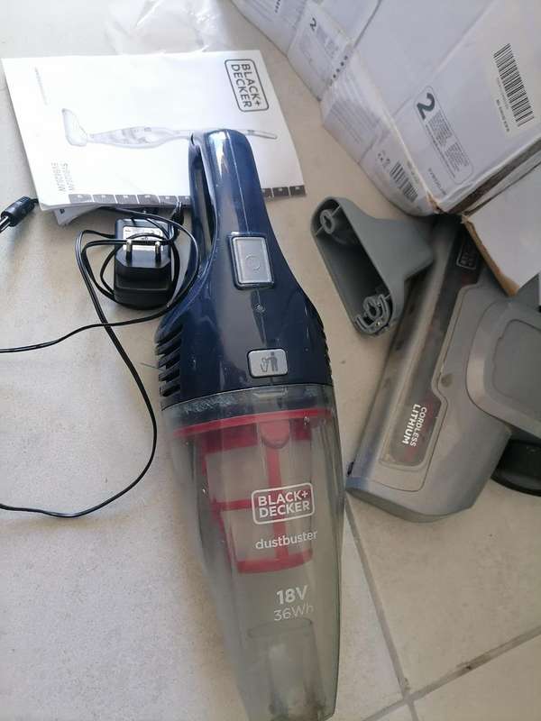 DEFECTIVE BLACK AND DECKER DUST BUSTER, CORDLESS VAC IN BOX WITH ATTACHMENTS*