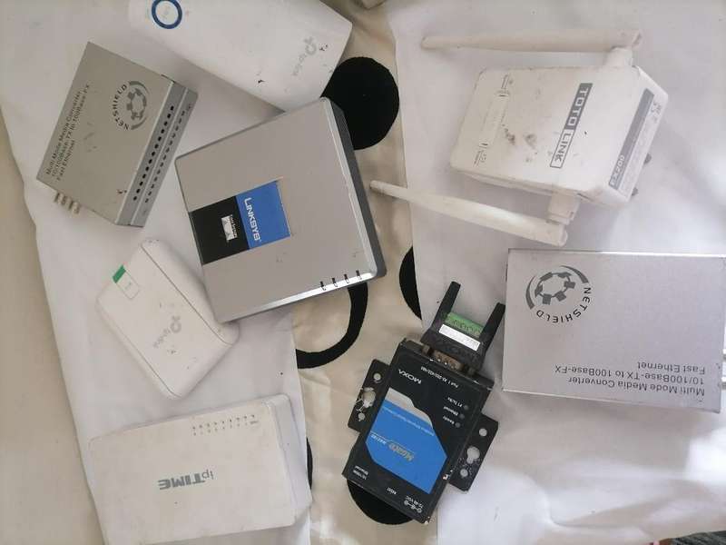 bulk lot of fibre boxes and range extenders