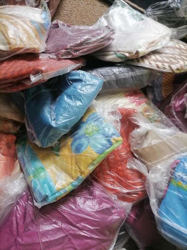 Large lot of mixed pillow cases from storage