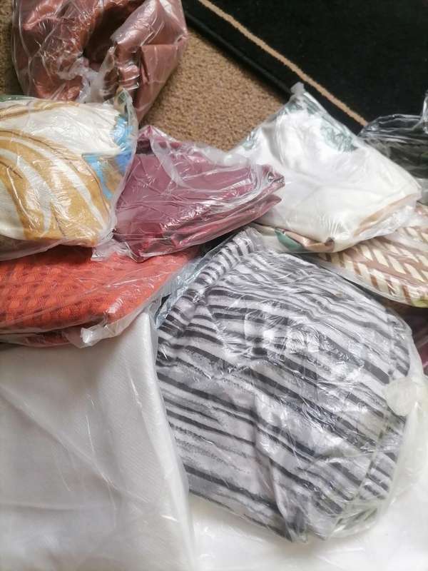 Large lot of mixed pillow cases from storage
