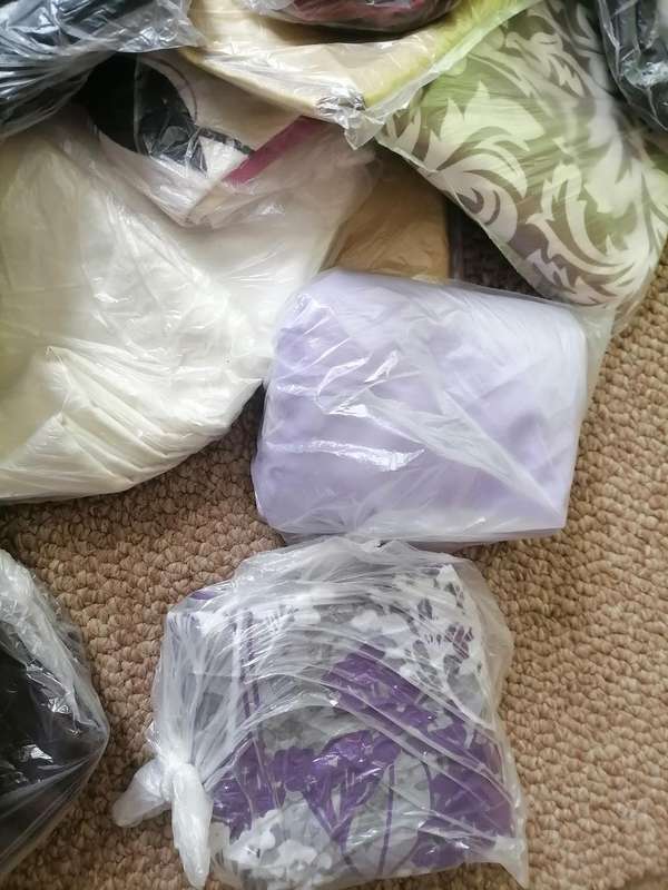 Large lot of mixed pillow cases from storage