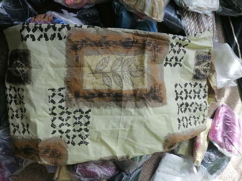 Large lot of mixed pillow cases from storage