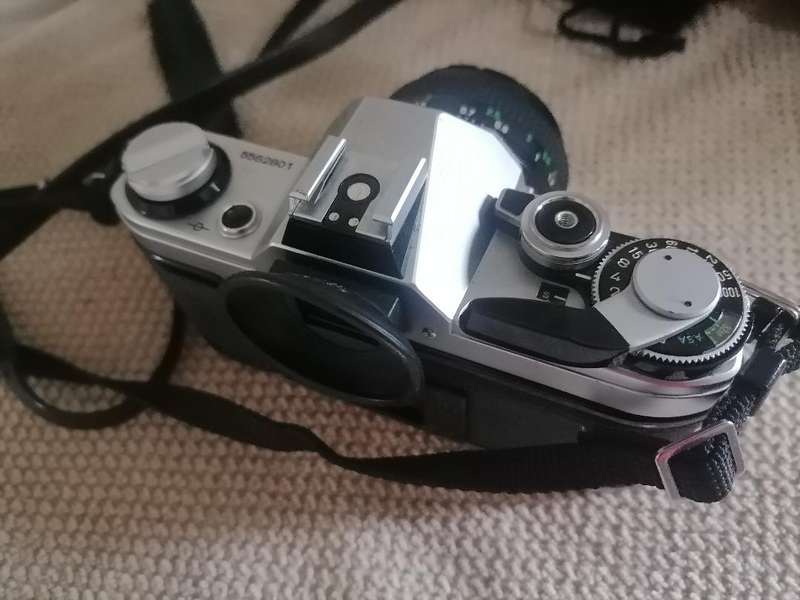 Vintage Canon AE-1 35mm SLR Camera with 50mm 1:1.8 Lens
