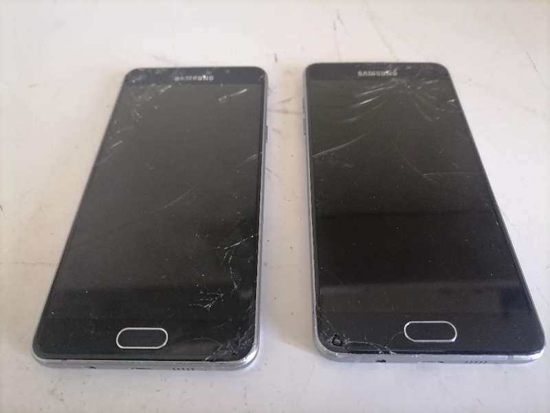 Lot of 2 x Defective Samsung A5 Cell Phones - One Bid for Both