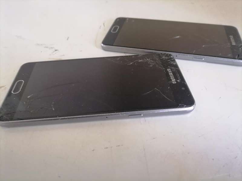 Lot of 2 x Defective Samsung A5 Cell Phones - One Bid for Both