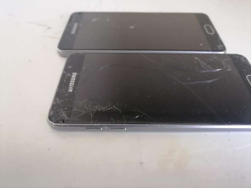Lot of 2 x Defective Samsung A5 Cell Phones - One Bid for Both
