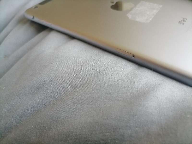 Apple iPad A1490 with pouch, front glass cracked. Sold as is.