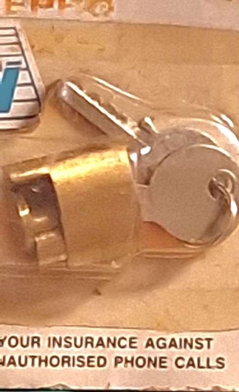 Carded Vintage HARP No 561 Telephone Lock for Rotary Dialing Phones.