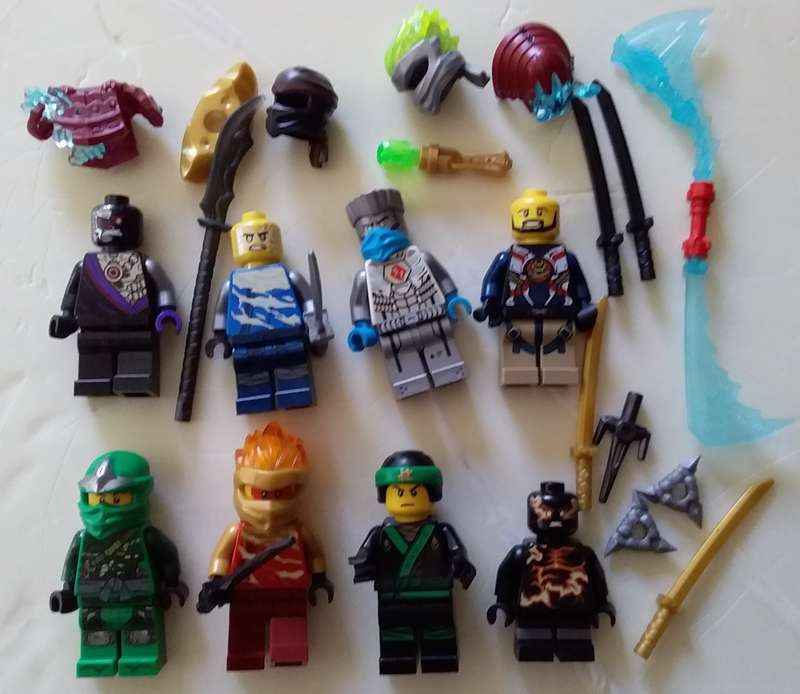 8 Lego Ninjago Minifigures and accessories