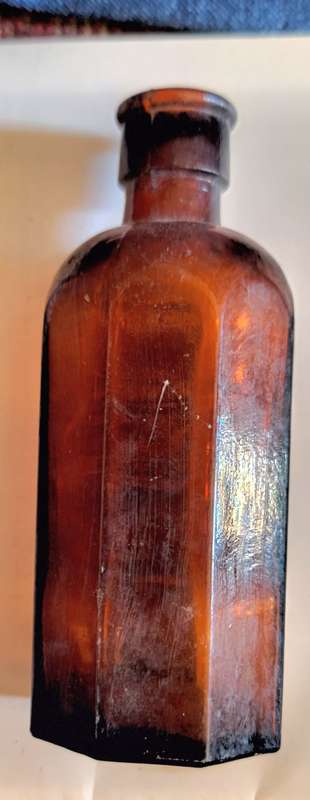 Vintage Small Octagonal Brown Glass Milton Bottle
