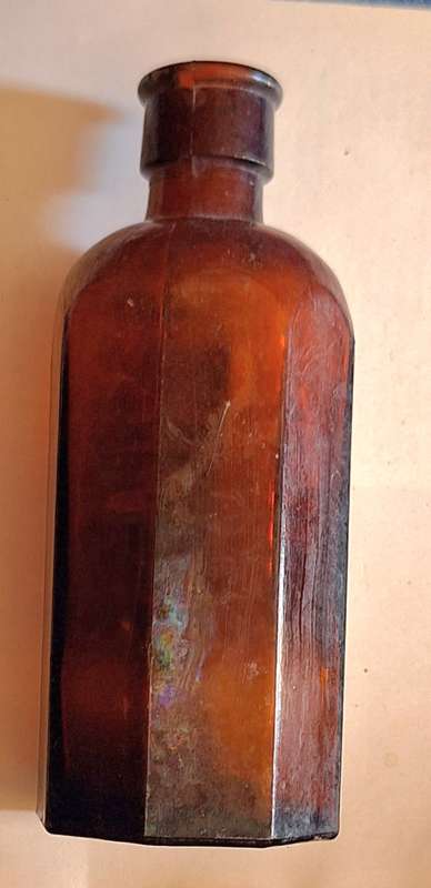 Vintage Small Octagonal Brown Glass Milton Bottle