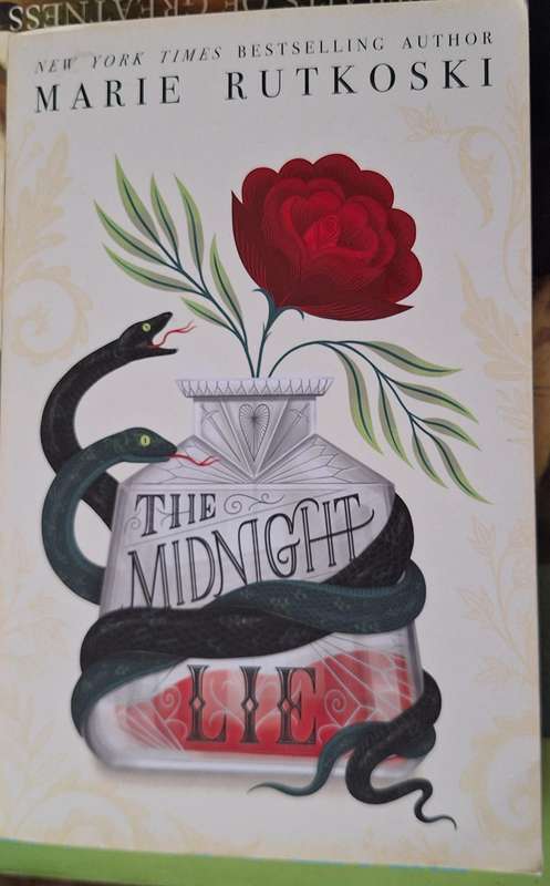 The Midnight Lie by Marie Rutkoski Paperback