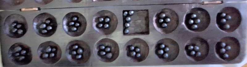 Mancala tradition African Board Game with "seed" stones