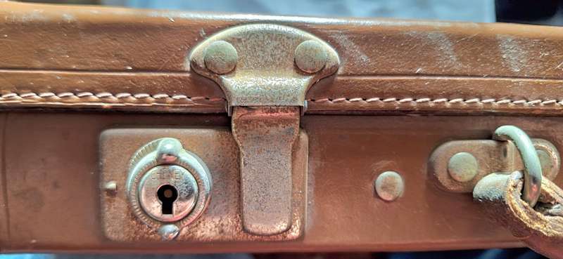Vintage Masonic Suitcase with letters E.V.M. Lid front corners need stitching
