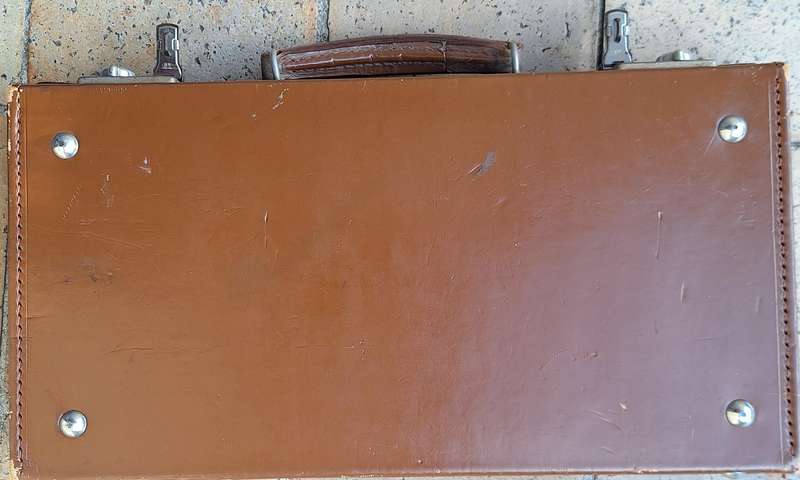 Vintage Masonic Suitcase with letters E.V.M. Lid front corners need stitching
