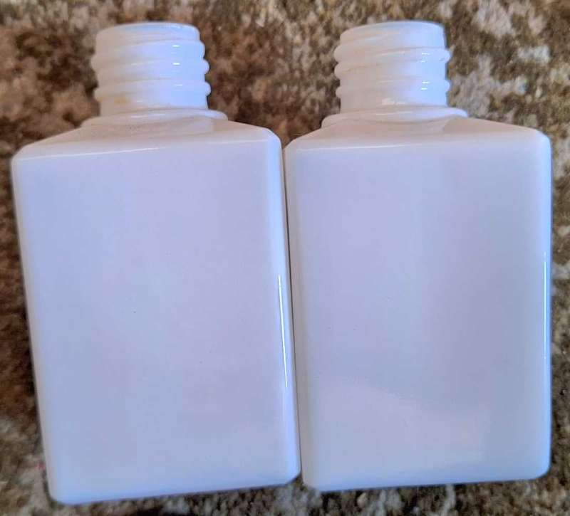 2 Vintage Milk Glass Possibly Perfume bottles