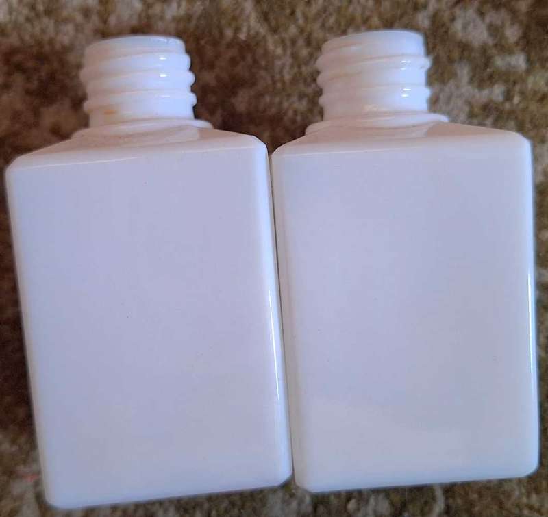 2 Vintage Milk Glass Possibly Perfume bottles