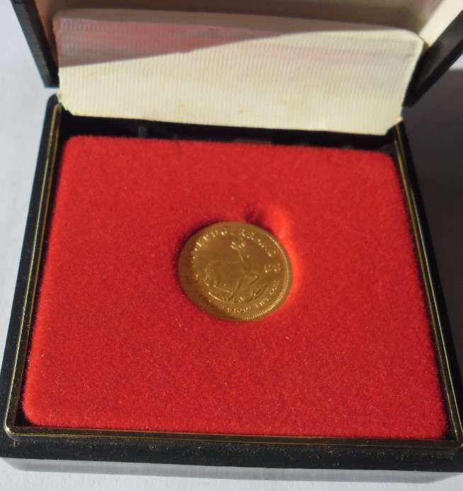 1988  1/10TH BULLION GOLD COIN WITH MINOR SCRATCHES IN TIMESHARE HOLDER