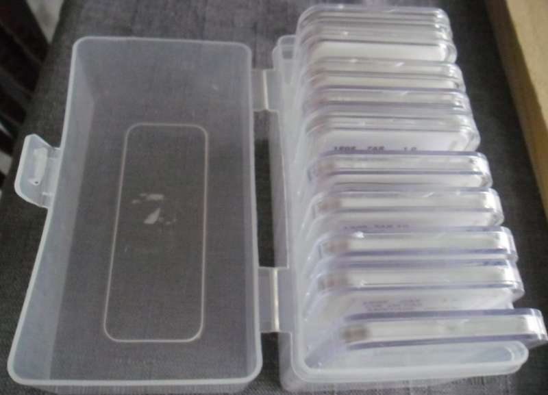 PLASTIC STORAGE BOX USED WITH 10 ODD COIN SLABS IN GOOD CONDITION LOT FOR ONE BID NO COINS INC.