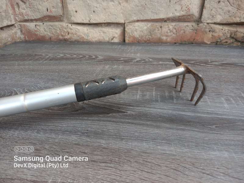 Compact Silver Garden Rake  Extendable Design for Easy Gardening - Durable Silver Finish