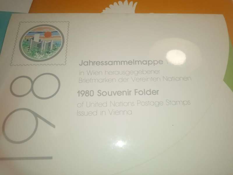 Three 1980 UN Souvenir folders containing mint stamp sets