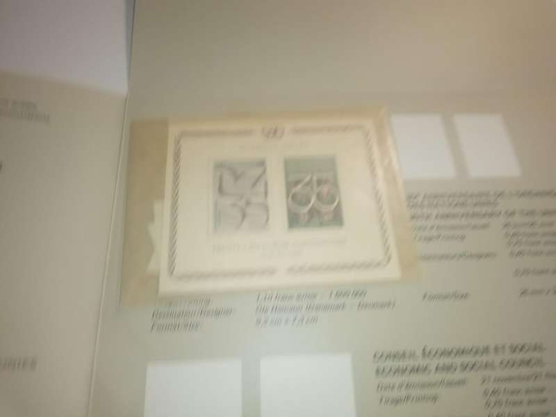 Three 1980 UN Souvenir folders containing mint stamp sets