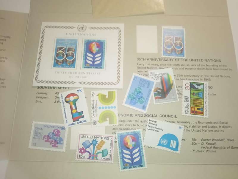 Three 1980 UN Souvenir folders containing mint stamp sets