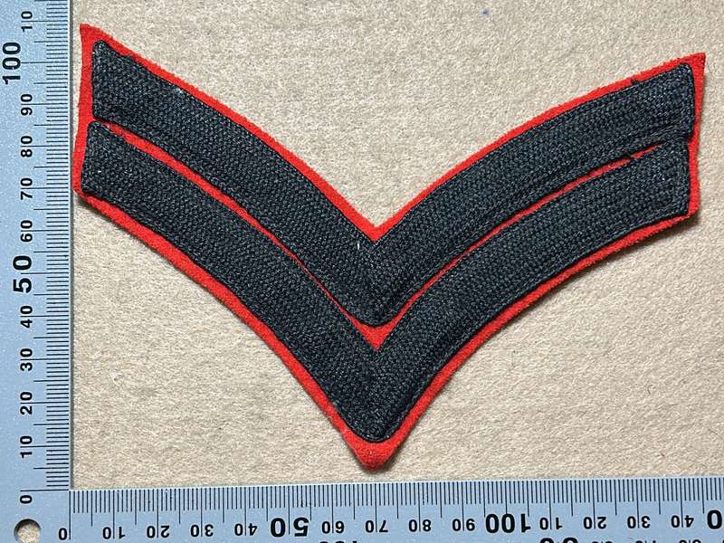 RHODESIA REGIMENT - CORPORAL SLEEVE RANK ON RED