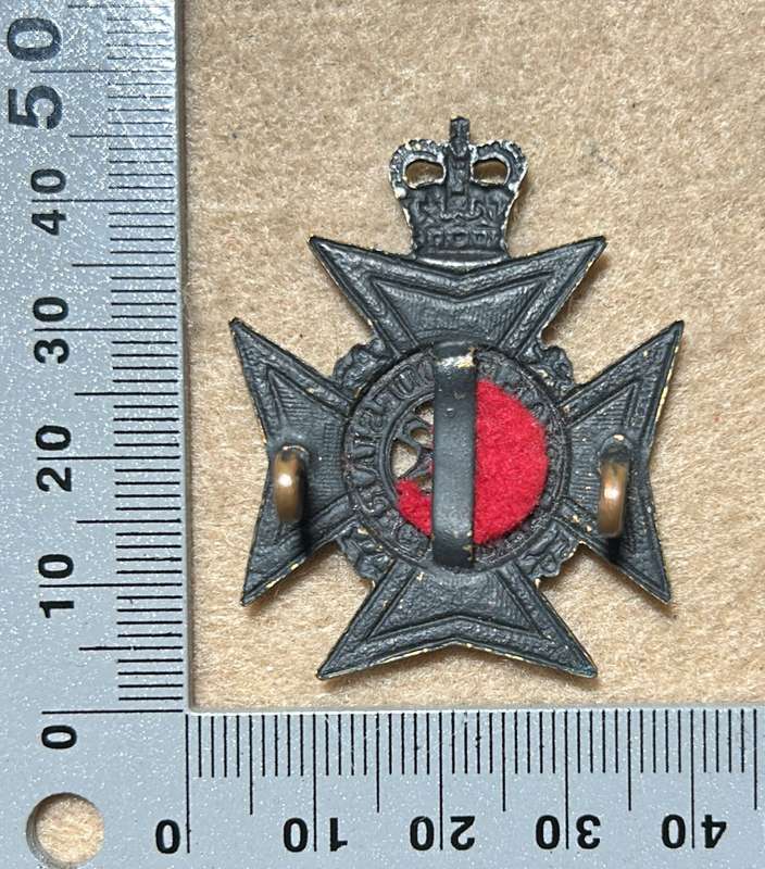 RHODESIA REGIMENT - BADGE RED BACKING QC