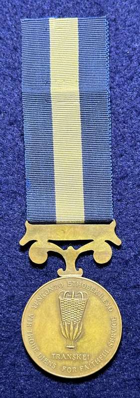 SA Military Decorations & Medals - Transkei 20 Years Service Medal - FS, No 56, Named WO Nqweniso