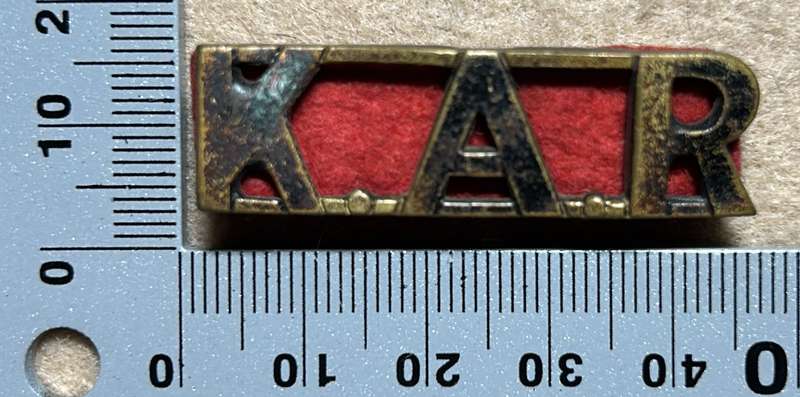 RHODESIA KINGS AFRICAN RIFLES - KAR SHOULDER TITLE WITH BACKING FELT