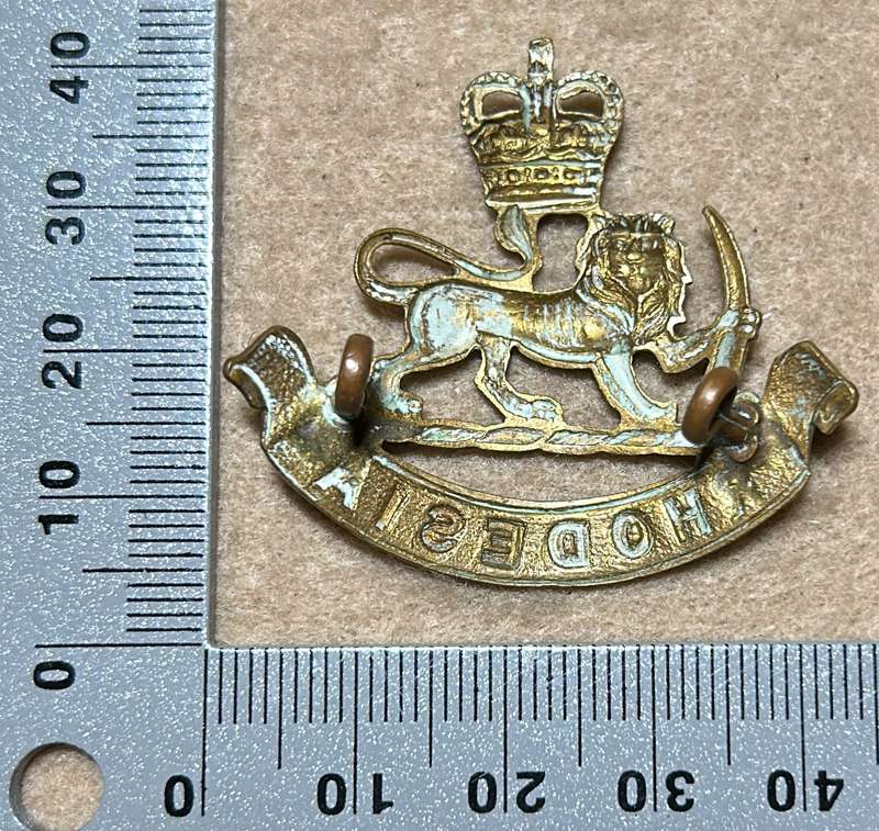 RHODESIA NYASALAND SC - QC CAP BADGE - 1957-72