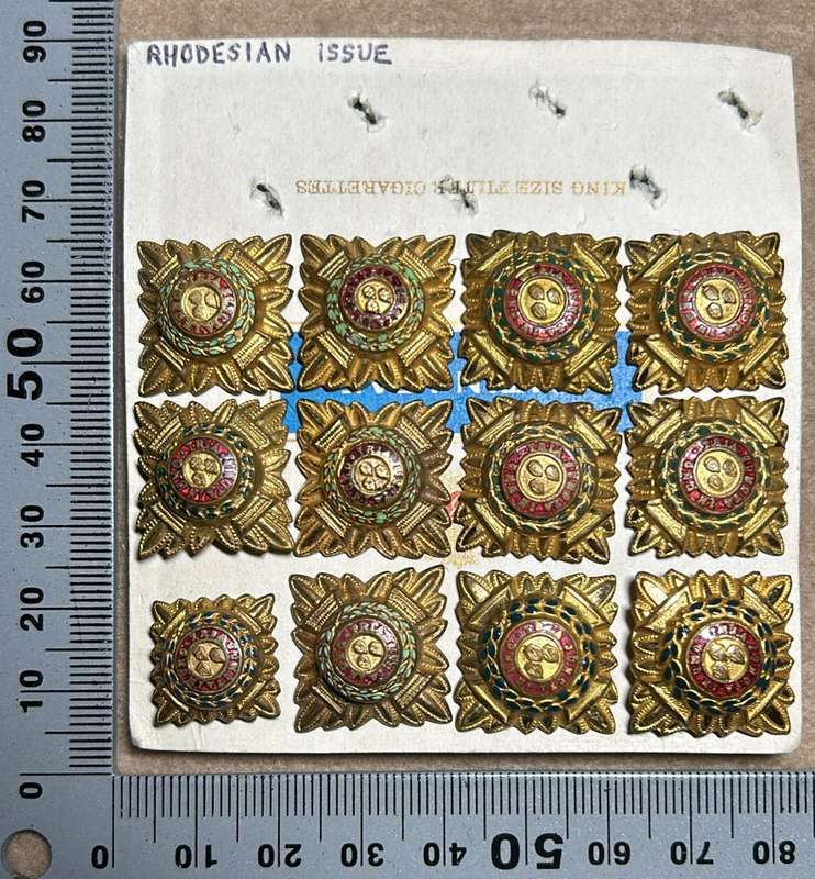 RHODESIA CROWNS AND PIPS - 12 BRASS WITH RED ENAMEL MEDIUM PIPS