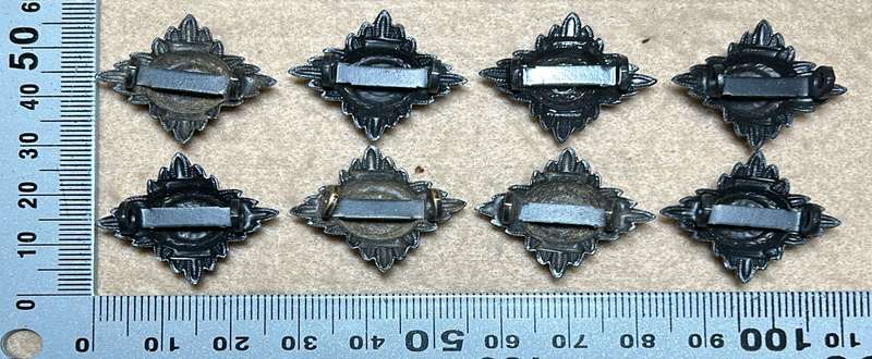 RHODESIA CROWNS AND PIPS - 8 BLACK BRASS PIPS