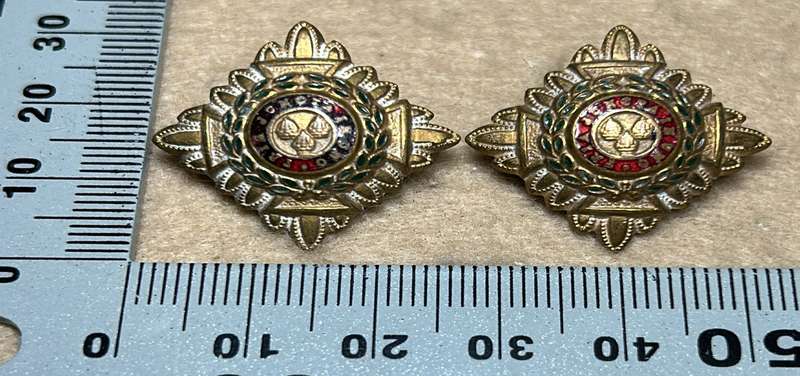 RHODESIA CROWNS AND PIPS - 2 BRASS PIPS WITH RED ENAMEL