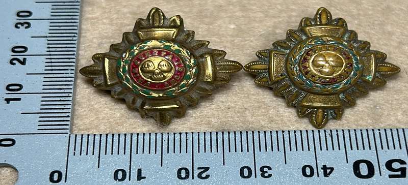 RHODESIA CROWNS AND PIPS - 2 BRASS PIPS WITH RED ENAMEL