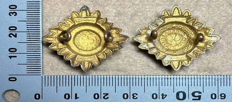 RHODESIA CROWNS AND PIPS - 2 BRASS PIPS WITH RED ENAMEL