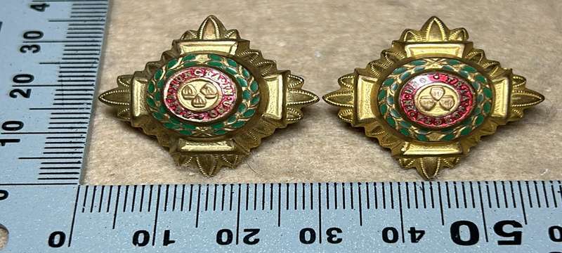 RHODESIA CROWNS AND PIPS - 2 BRASS PIPS WITH RED ENAMEL