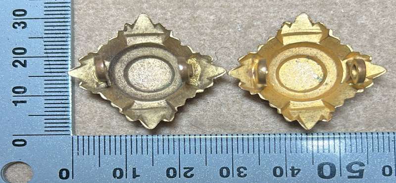 RHODESIA CROWNS AND PIPS - 2 BRASS PIPS WITH RED ENAMEL