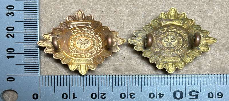 RHODESIA CROWNS AND PIPS - 2 BRASS PIPS WITH RED ENAMEL