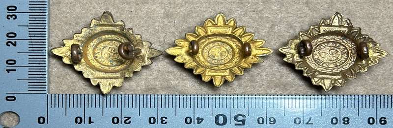 RHODESIA CROWNS AND PIPS - 3 BRASS PIPS WITH RED ENAMEL