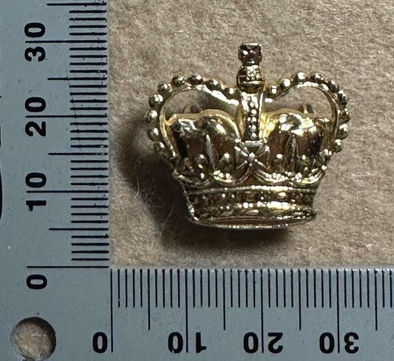 RHODESIA CROWNS AND PIPS - 1 ANNODISED BRASS QC