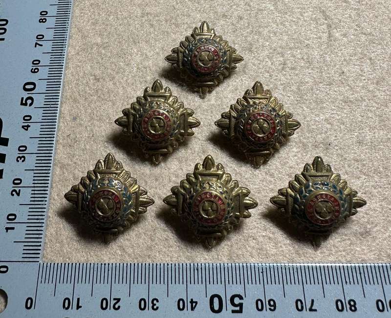 RHODESIA CROWNS AND PIPS - 6 BRASS PIPS WITH RED ENAMEL