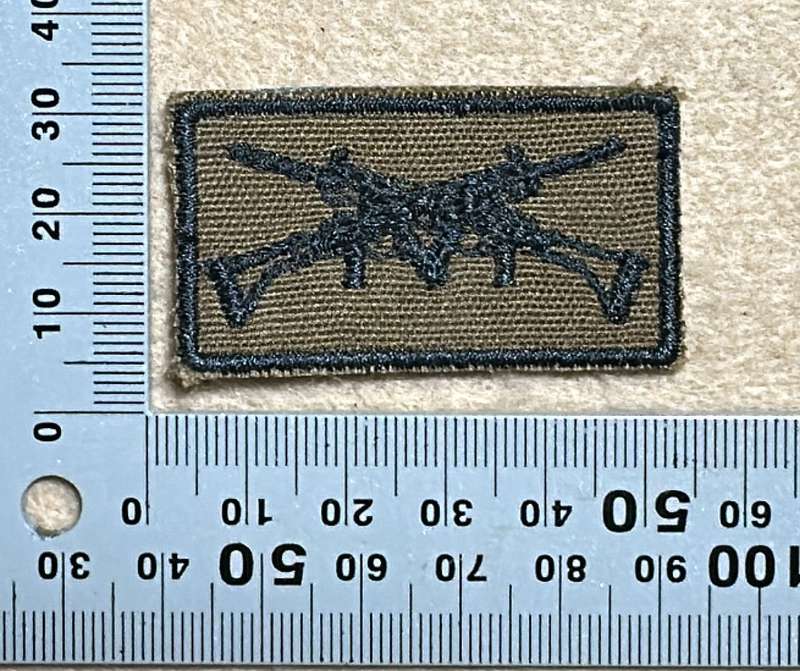 SWA Marksman Qualification Badge embroidered on Nutria