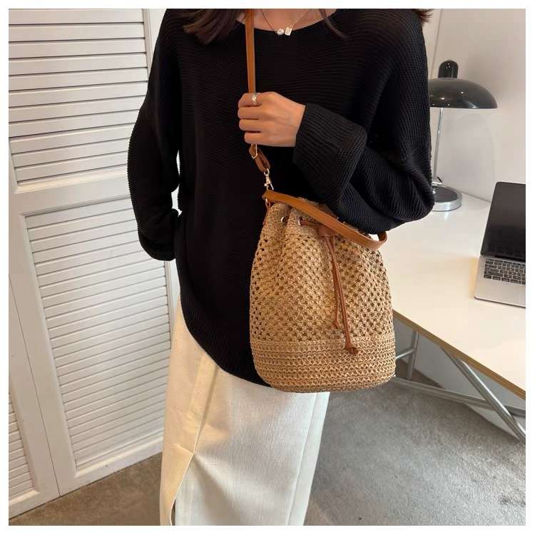Handbag woven straw bucket style draw string closure cross body  shoulder bag