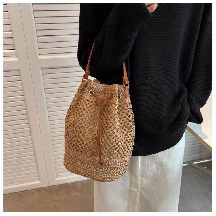 Handbag woven straw bucket style draw string closure cross body  shoulder bag