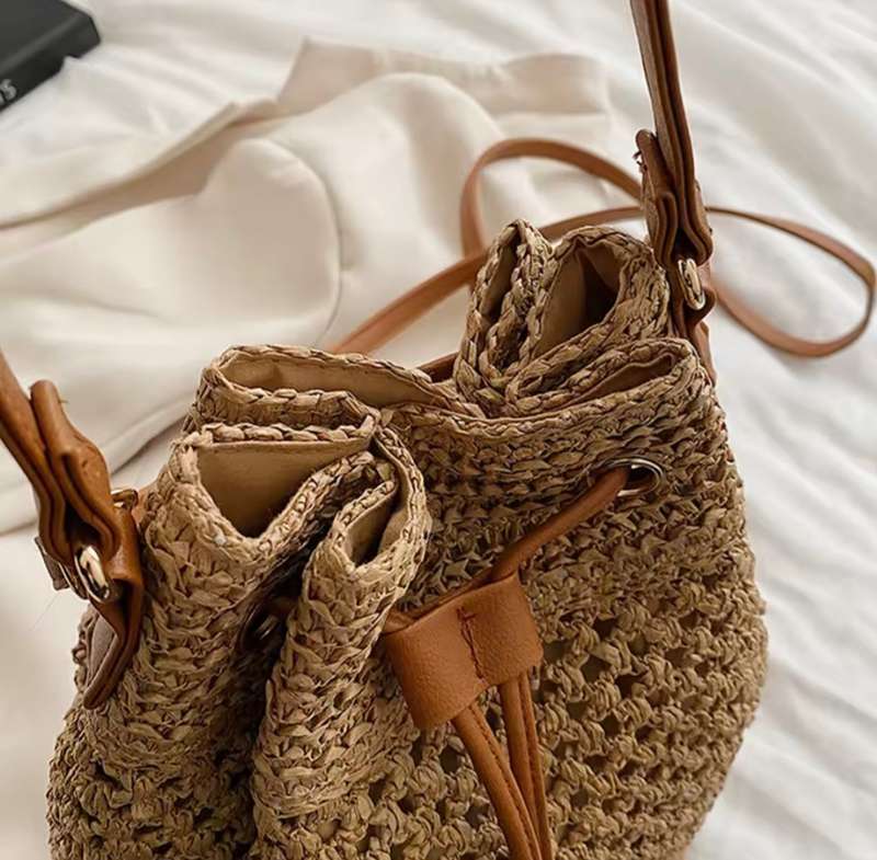 Handbag woven straw bucket style draw string closure cross body  shoulder bag